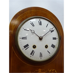  Edwardian inlaid mahogany arched top mantel clock with white Roman dial, twin train movement striking the half hours on a coil, brass bun feet, H34cm  