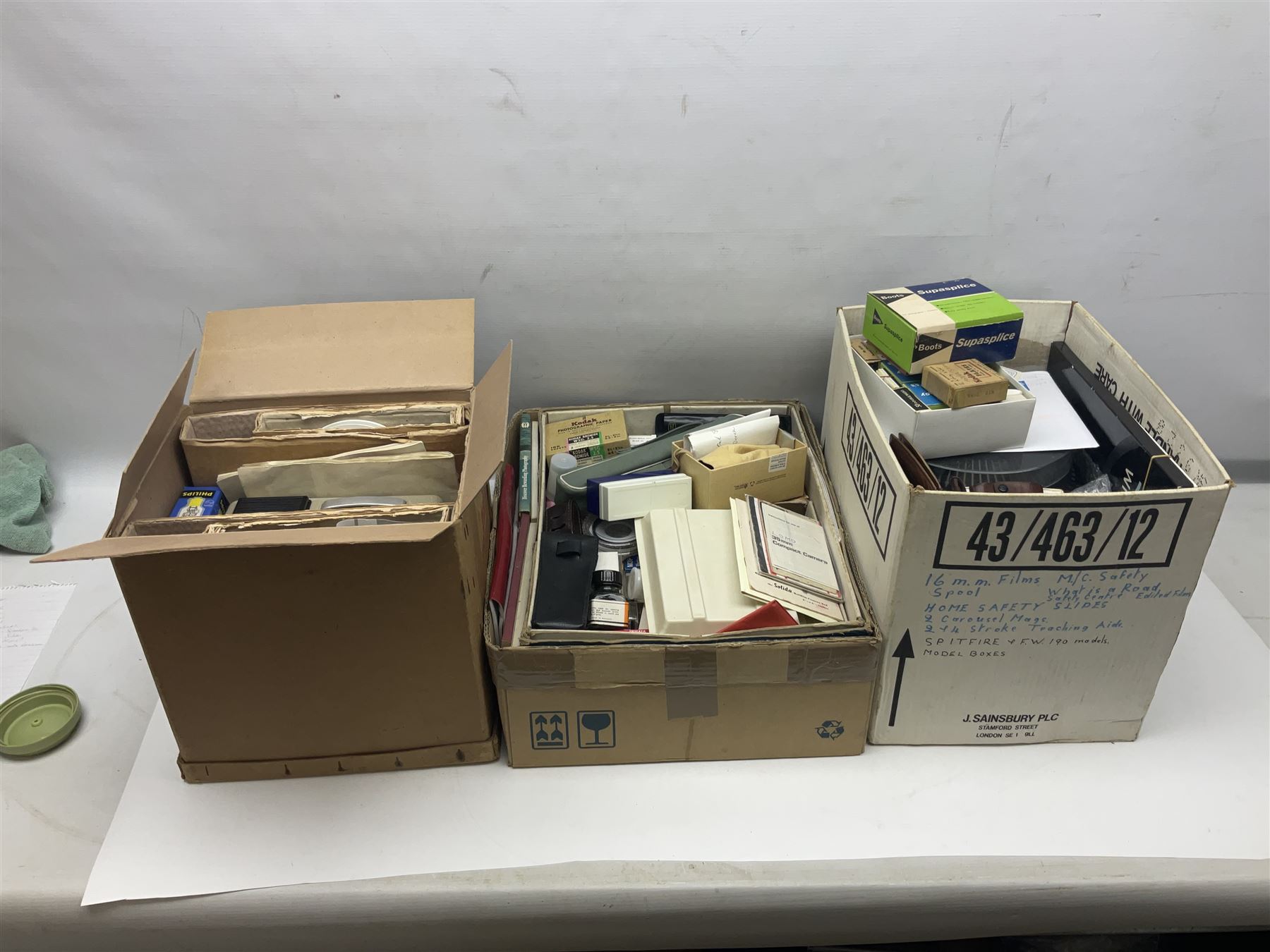 Large collection of projectors and equipment, to include Alphaxia Gnome projector, Kodak Brownie projector, slide containers, projector screen, etc, in six boxes