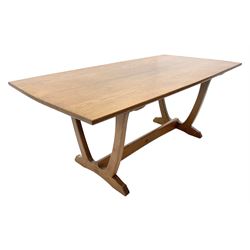 'Acornman' oak rectangular dining table, slightly curved rectangular top supported by two curved uprights, on shaped sledge feet connected by stretcher, by Alan Grainger of Brandsby, York