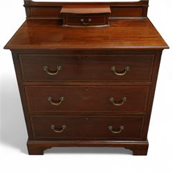 Edwardian mahogany herring-bone inlaid dressing chest, with swivel bevelled dressing mirror, supports with finials, and trinket drawer above chest with three graduated drawers on bracket feet
