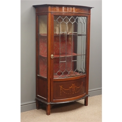  Edwardian mahogany inlaid display cabinet, lead glazed bow front, on four supports, W78cm, H142cm, D45cm  