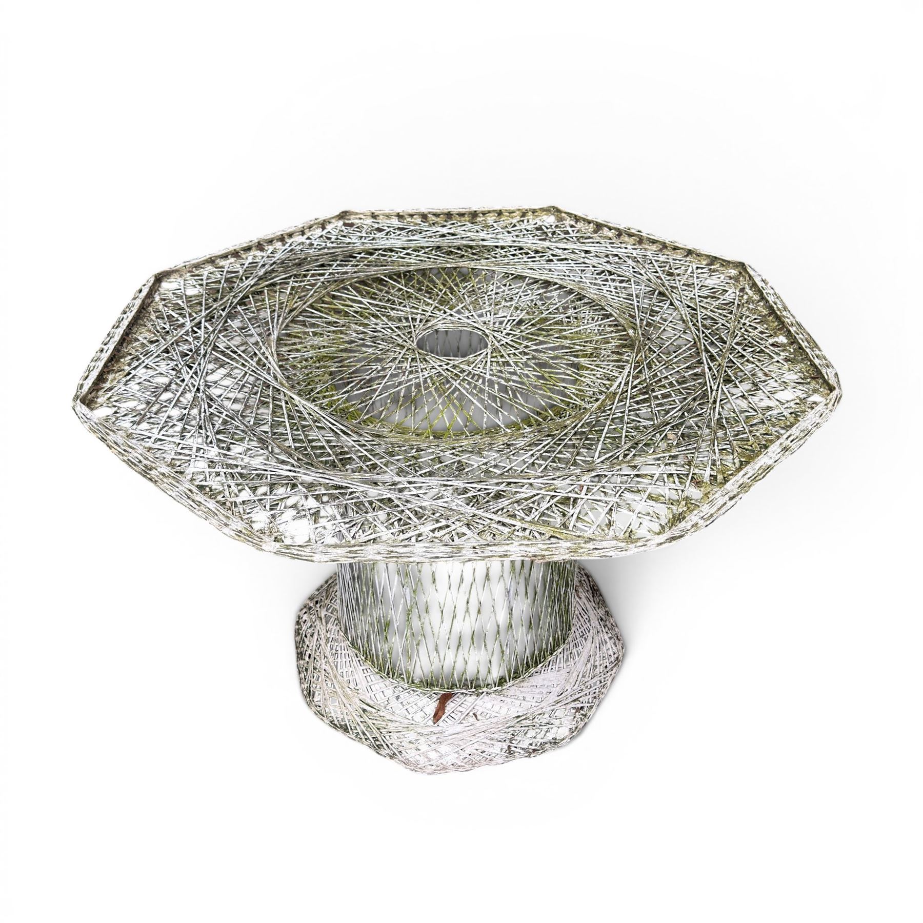 Two French early 20th century painted wicker octagonal garden tables, circular pedestals with parasol opening; with matching side table (3)