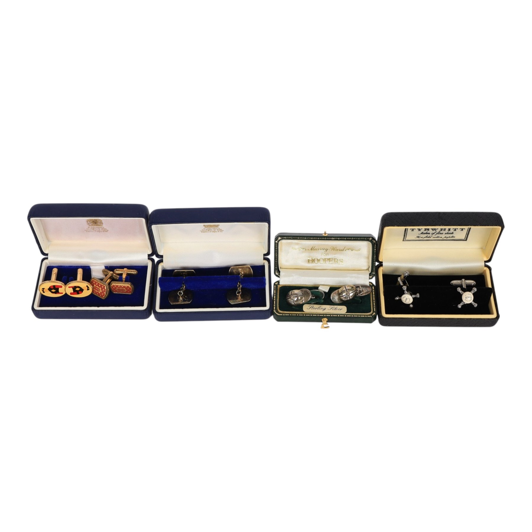 Three pairs of silver cufflinks, comprising jockeys cap pair, Halcyon days teddy bear enamel pair and a 1995 enamel pair, together with two other pairs of novelty cufflinks
