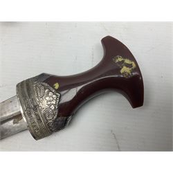 Omani Khanjar dagger, the 12.5cm curved blade with pronounced medial rib to either side, waisted horn style hilt with dome shaped pommel and inlaid pique work; in an intricately filigree decorated white metal scabbard with rings woven into the belt mount L25cm overall