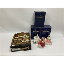 Royal Doulton figures, Memories HN2030, Country Rose HN3221, Top O' the Hill HN1834, all with original boxes, John Beswick figure of a seated piglet, Beswick Beatrix Potter Mrs Rabbit and Peter figure, and quantity of Sandland Character Ware jugs