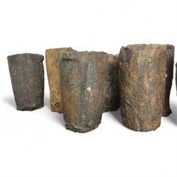 Nine lava stone iron smelting crucible pots in various conditions