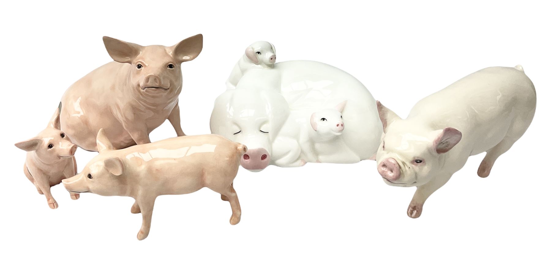 Collection of Beswick pig figures, to include John Beswick Little Likeables ‘Hide and Sleep’, white boar pig and John Beswick trio of pigs, all marked beneath (5)