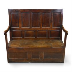 18th century oak high-back settle or hall bench, the panelled back and arm terminals over ...