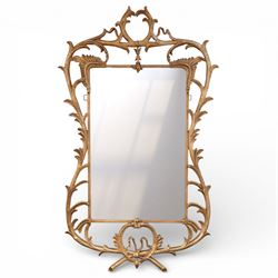 Large metal framed wall mirror, of rectangular form within an ornate openwork frame cast w...
