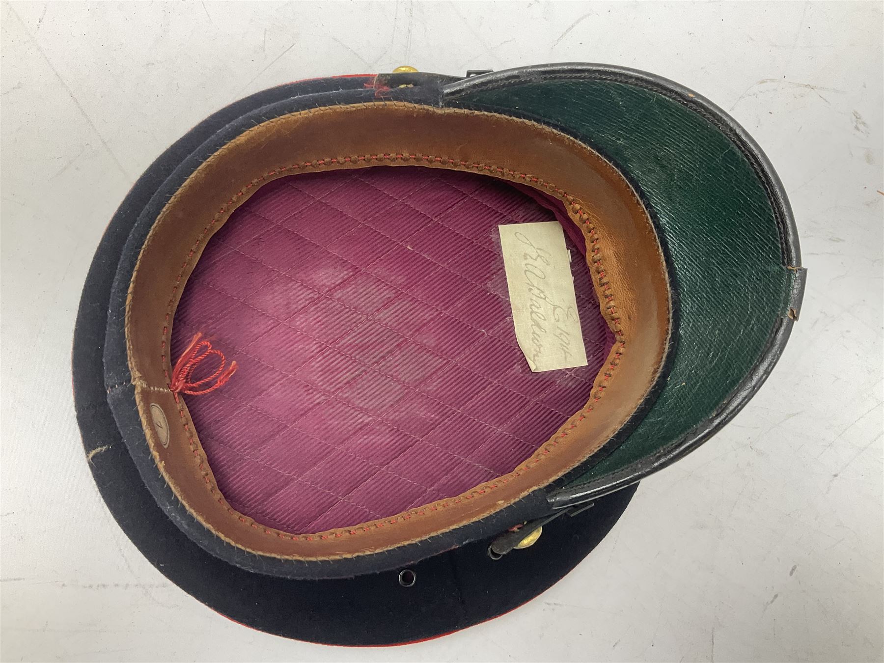 Royal Military College Sandhurst parade uniform with peaked cap and two-piece mess dress, all bearing historic manuscript labels for J.E.A. Baldwin, possibly Air Marshal Sir John Eustace Arthur Baldwin (1892-1975) who served in the British Army 1910-18 & 1944-58 and in the RAF 1918-44.