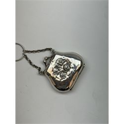 Victorian and later silver chatelaine, the shaped and foliate pierced clasp with embossed oval panel of a courting couple, hallmarked Levi & Salaman, Birmingham 1899, supporting six accessories on five chains: a circular mirror embossed with putti, hallmarked Henry Matthews, Birmingham 1911, pencil holder engraved with foliate scrolls, hallmarked Francis Webb, Birmingham 1914, conical scent bottle decorated with bamboo, (unmarked but testing as silver), aide memoire embossed with putti, hallmarked Samuel M Levi, Birmingham 1911, tape measure of compressed spherical form, hallmarked Henry Matthews, Birmingham 1899, and a purse with embossed putti, hallmarked Birmingham 1909, makers mark worn and indistinct, at longest point L31cm

