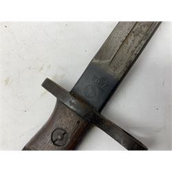 WW1 American Model 1917 Enfield bayonet by Remington with 43cm fullered steel blade; in leather scabbard with frog L59cm overall; and American M5A1 knife bayonet marked MILPAR COL to the cross-piece (no scabbard) (2)
