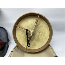 Dulcet eight-string banjo mandolin with mother-of-pearl inlaid ebonised fingerboard L55.5cm; cased; and Irish mahogany bodhran hand drum with inlaid stringing and vellum top D46.5cm; in soft carrying case with double ended beater (2)