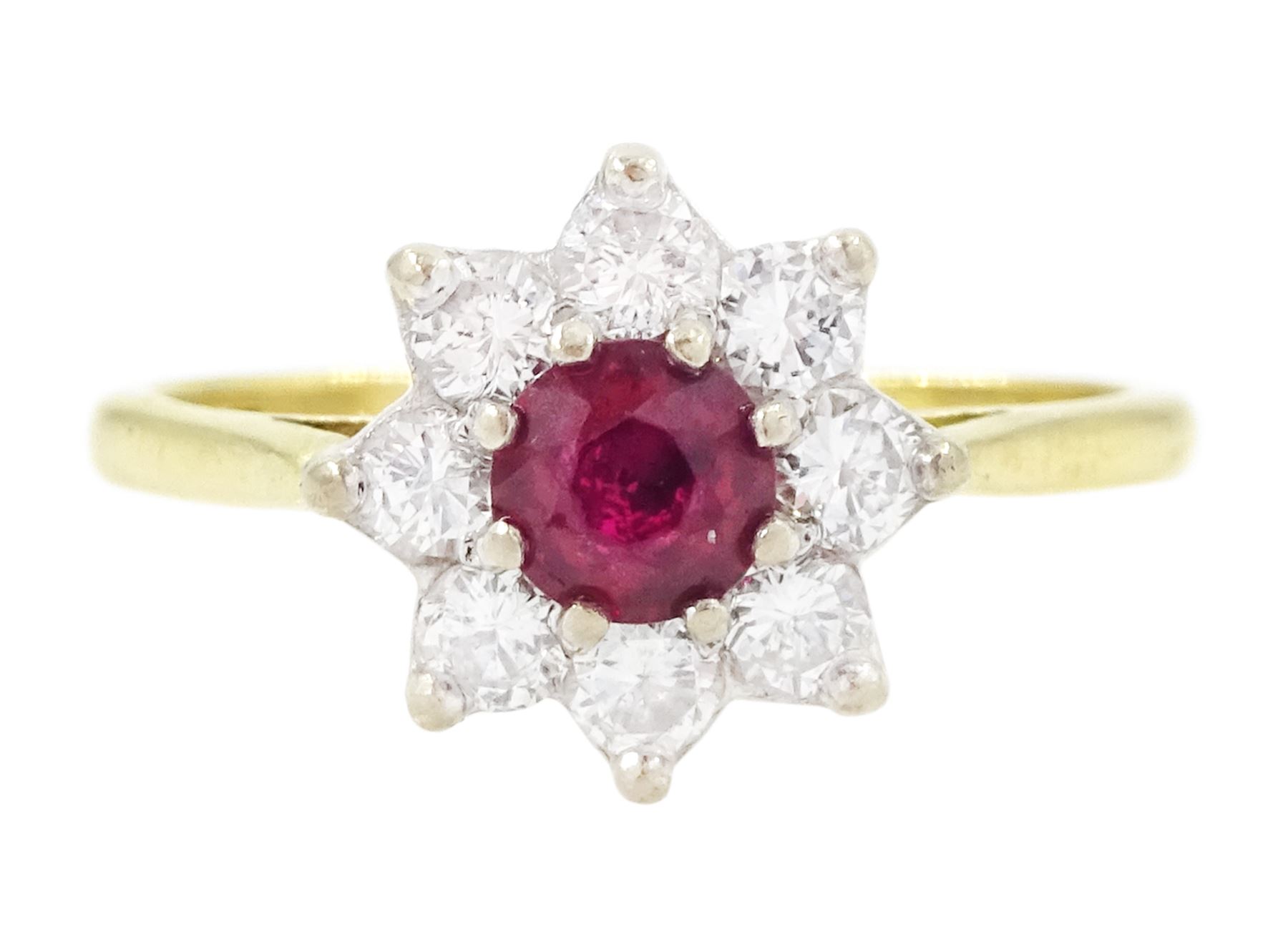 Gold ruby and diamond cluster ring, round cut ruby of approx 0.25 carat, surrounded by eight round brilliant cut diamonds, stamped 18ct, total diamond weight approx 0.40 carat