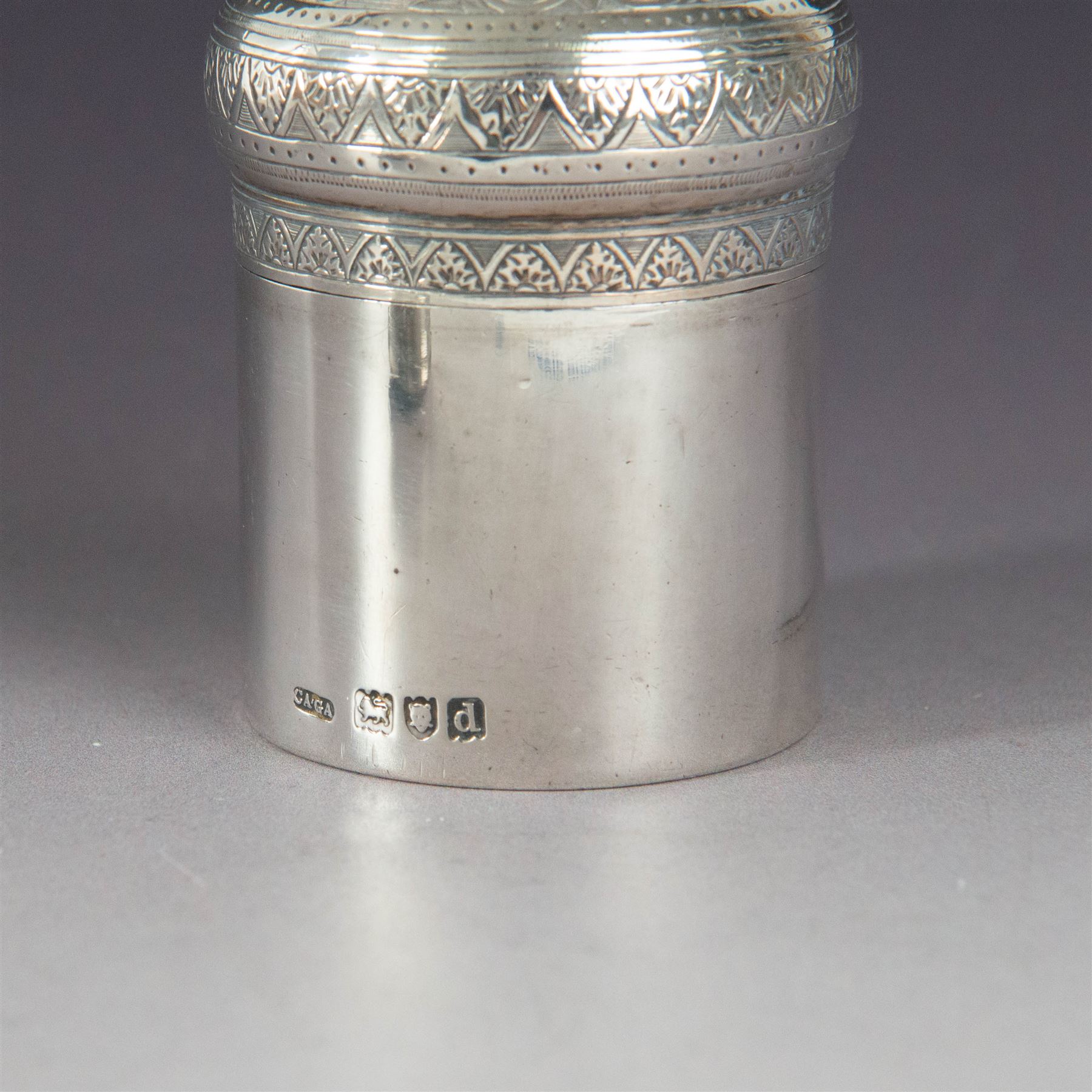 Late Victorian silver jar with cover, of cylindrical form with  domed cover engraved with initials, hallmarked Charles & George Asprey, together with a small ecclesiastical trinket box, engraved with cross to cover and with personal engraving beneath, hallmarked Edgar Ernest Davis, London 1944, taller jar H6cm