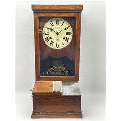 Early 20th century oak cased time recorder, circular Roman dial signed 'Time Recorders Leeds Ltd. Park Lane & Oxford Row Leeds', the glazed door signed 'National Time Recorder Co Ltd. London...'