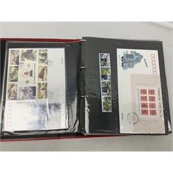 Mostly Chinese stamps including  covers and postcards, many being from the 80s and 90s, housed in ten folders