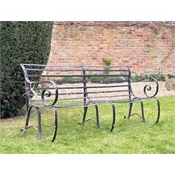 19th century strap iron park bench with scrolled arms and supports. (a/f) H80cm, L185cm, D60cm. 