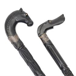 Edwardian ebonised evening cane with silver collar and horses head handle Birmingham 1906 and another with dogs head handle Birmingham 1907