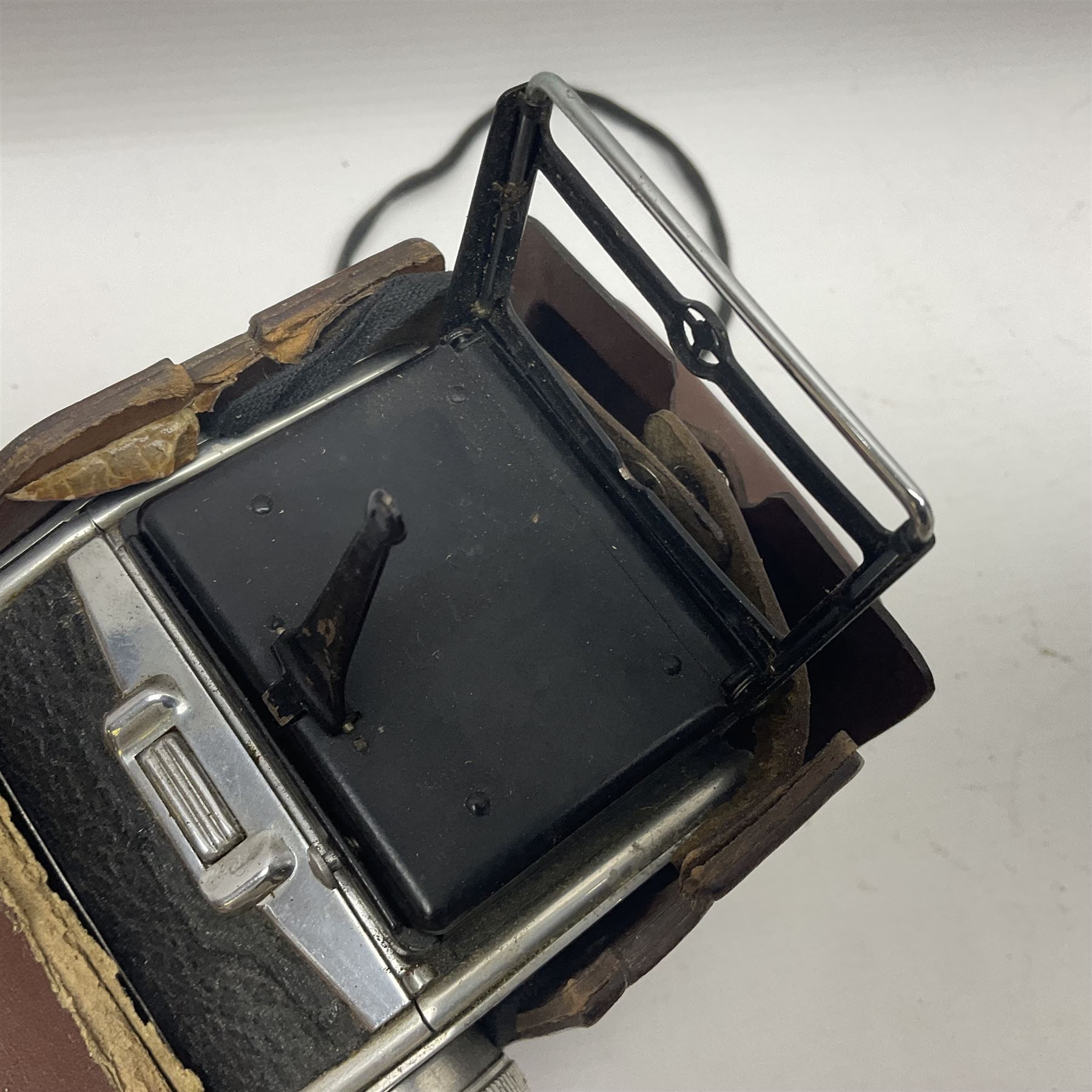 Franke & Heidecke Rolleicord twin lens camera, serial number 012706 with Heidoscop-Anastigmat f=7.5cm' lens and a 'Carl Zeiss Jena Triotar 1:4.5 f=7.5cm' lens, serial no 1474898, together with three similar cameras, including SEM TLR, serial no 420218, Ising Pucky box and Ferrania Elioflex, three in leather carry cases