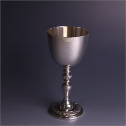 Late 20th century limited edition silver goblet, produced by Garrard & Co Ltd  to commemorate the silver wedding anniversary of Her Majesty Queen Elizabeth II and His Royal Highness the Duke of Edinburgh, the bowl engraved with Royal cyphers and anniversary dates, upon a knopped stem and embossed foot, no. 77/2000, hallmarked Garrard & Co Ltd, London 1972, H15cm