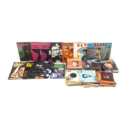 Elvis Presley - over one-hundred and seventy 45rpm records by RCA etc including six EPs , flexidisc 'The Truth About Me', ten LPs, two books, postcards etc; and signed picture of Marty Wilde
