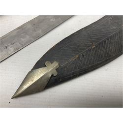 Indian kukri with 29cm curving steel blade and nickel mounted horn grip; in leather covered scabbard with one skinning knife L42cm overall; Hitler Youth knife with scabbard in relic condition; and three African graduated knives each with crudely carved wooden grips and painted leather covered scabbards (5)