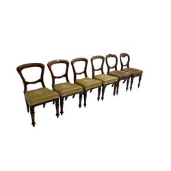 Eight late 19th or early 20th century mahogany dining chairs, upholstered seats on turned supports