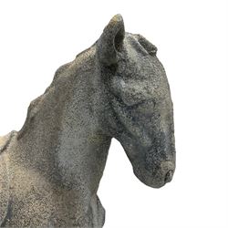 Cast stone figure of a horse, raised upon rectangular granite plinth