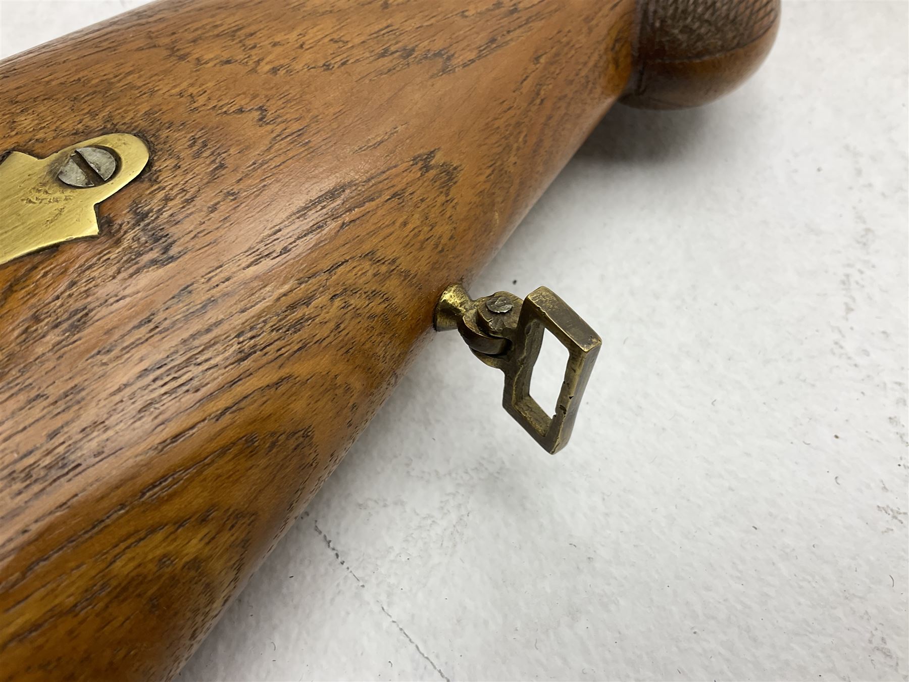 20th century Indian percussion musket, the 81cm octagonal barrel with under rib and ramrod, brass fittings including front and rear swivels, oak half stock with cheek piece and chequered pistol grip stamped 1589 L124.5cm overall