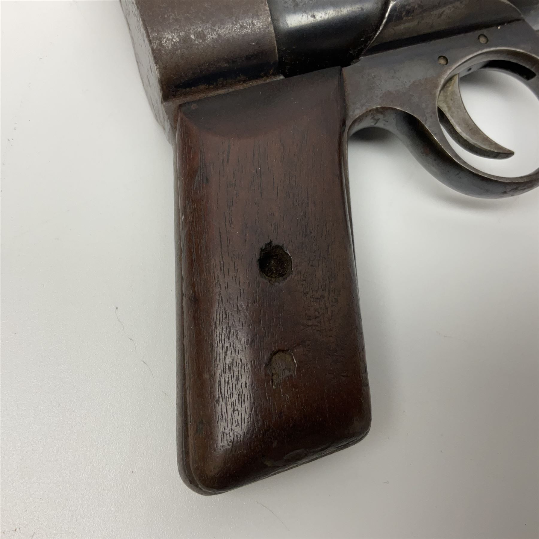 Webley 'Junior' .177 air pistol with top lever action and wooden grips; marked The Webley Junior .177 Webley & Scott Ltd Birmingham 4 Made in England to left side of cylinder; numbered 078 to muzzle and J3007 to trigger guard; L21cm; together with part tin of Webley .177 Special Pellets NB: AGE RESTRICTIONS APPLY TO THE PURCHASE OF THIS LOT.