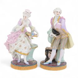 Pair of late 19th century French Letu & Mauger bisque figures, modelled as a gallant and his companion, with impressed marks beneath, H35.5cm, together with a 19th century French mantle vase, in the manner of Jacob Petit, the vase of cornucopia form painted with rose sprays and heightened with gilt, mounted with the figure of a trumpet player, upon a naturalistically modelled base mounted with a recumbent goat, H35cm