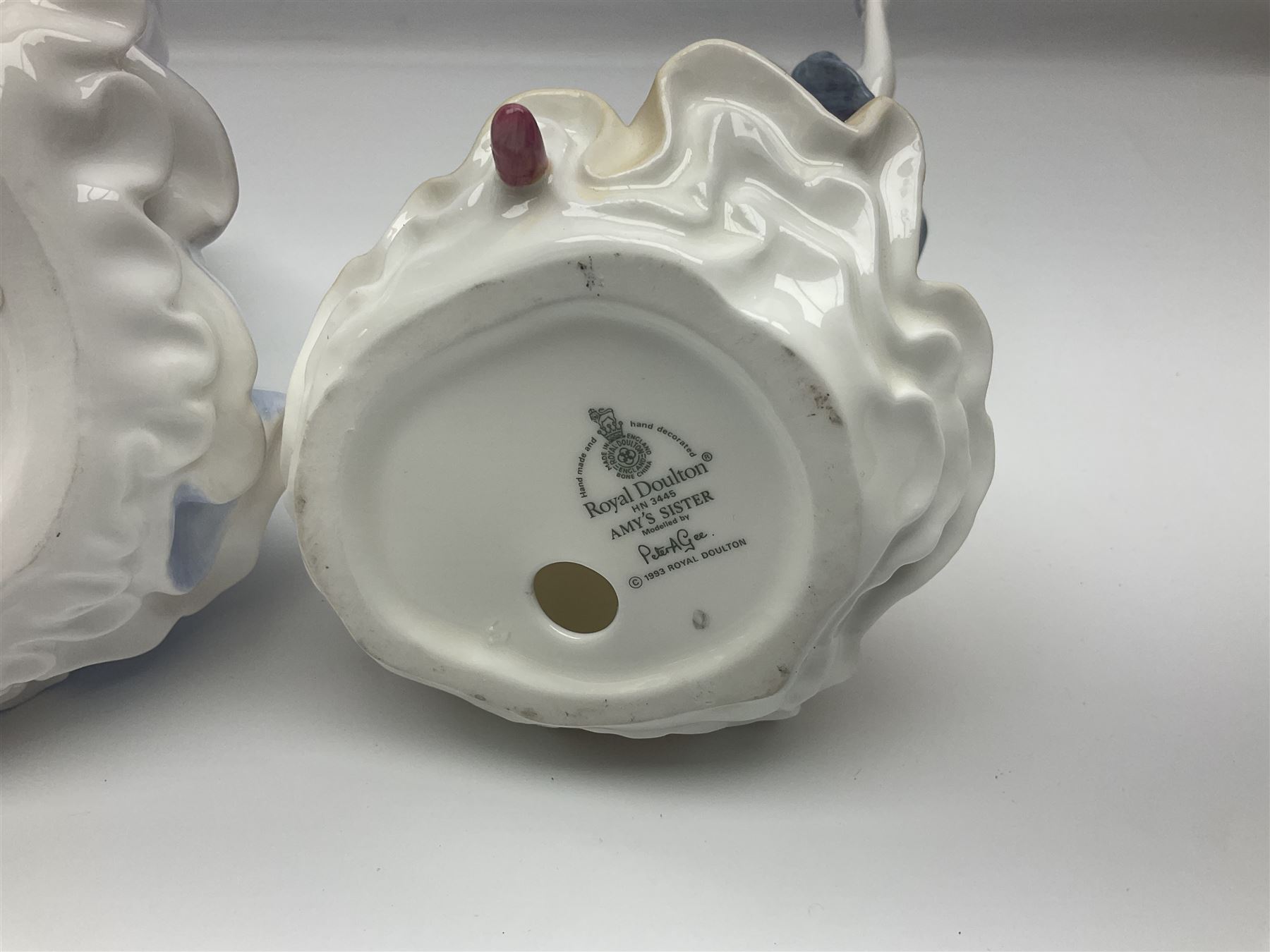 Seven Royal Doulton figures, to include Charity HN3087, Faith HN3082, Hope HN3061, Belle HN3703, etc, all with printed marks beneath