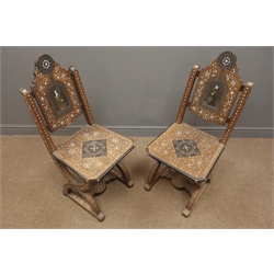  Pair 19th century Portuguese hardwood and mother of pearl and ivory inlaid chairs, one with a medieval woman depicted on the splat, the other a medieval man, W39cm, H96cm  