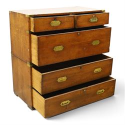19th century brass bound mahogany campaign chest, with brass bound corners and edges, recessed brass handles, the upper section with two short over one long drawer, the lower section with two long drawers