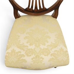 Bevan Funnell Reprodux - Regency design set of ten mahogany dining chairs, oval backs with central splat with rose motif, serpentine seat upholstered in damask fabric, raised on turned supports