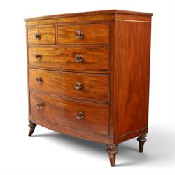 19th century mahogany bow-front chest, shaped top with ebony strung edge over banded frieze, fitted with two short over three long cock-beaded drawers, on turned feet