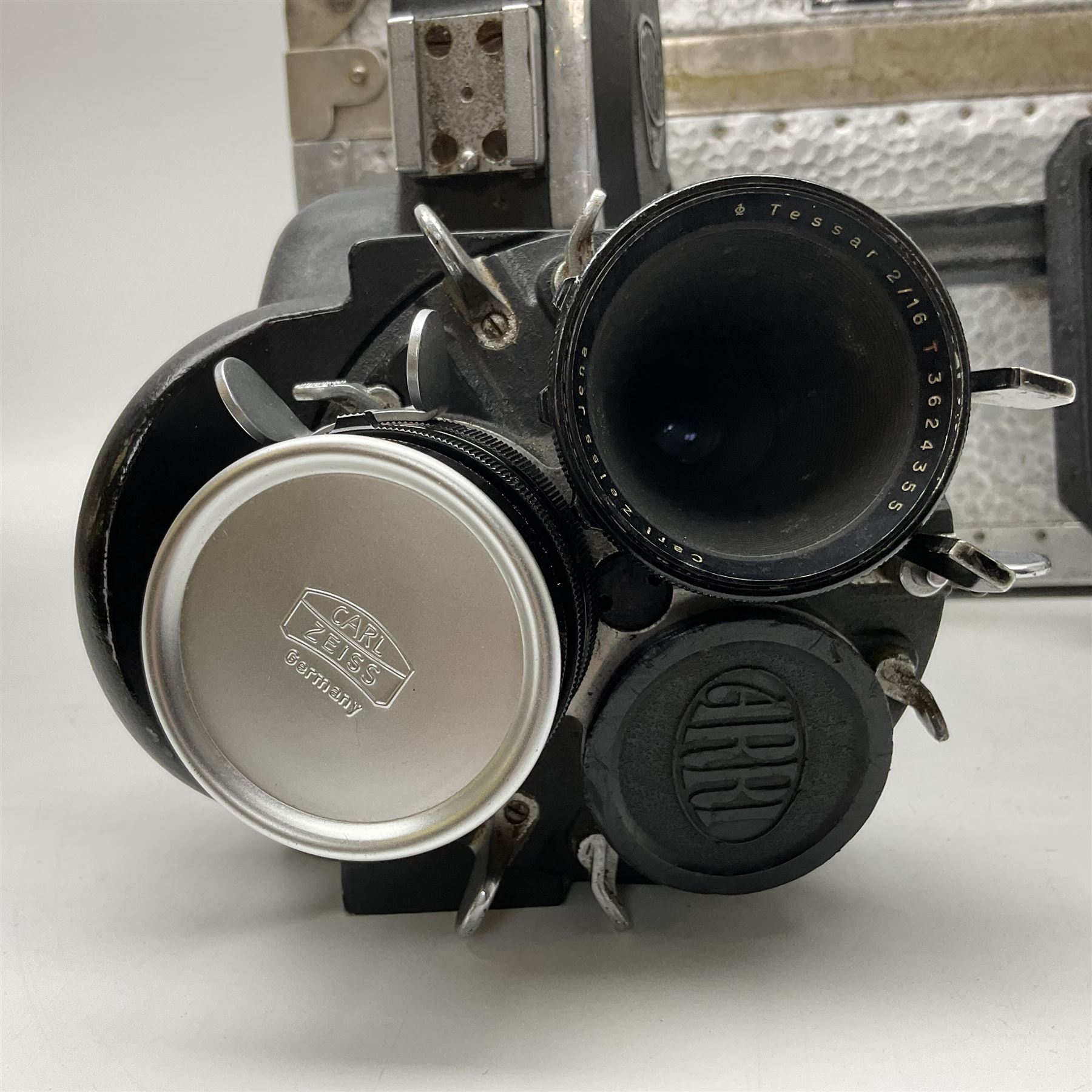 Arriflex 16SB camera body, serial no. 1784, with ' Carl Zeiss Distagon 1:2 f=8mm' lens, serial number 3860224, 'Carl Zeiss Jean Tessar 2/16' lens, serial no 3624355, camera pistol grip and other accessories, in fitted hard case
