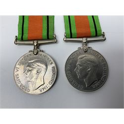 Ten WW2 medals comprising two 1939-1945 war medals, two Defence medals, two 1939-1945 Stars, two Africa Stars, France & Germany Star and Burma Star; together with bar of four miniature medals; all with ribbons