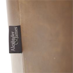 Alexander and James - pair of 'Jude' tub armchairs, traditional tub shape with buttoned back over deep seat, with studwork to the arm terminals, raised on turned front supports and splayed rear supports