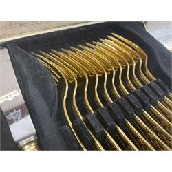 Bestecke Solingen canteen of gold plated cutlery for twelve place settings, including ladle, cake slice and serving spoons, contained within a briefcase, together with a matching set twelve of Bestecke Solingen gold plated fish knives and forks, in fitted case 