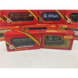 Hornby/Tri-Ang ‘00’ gauge - fifteen goods wagons to include freightliners with containers, ore wagons, closed vans etc; together with R404 Operating ore wagon set; all boxed (16) 
