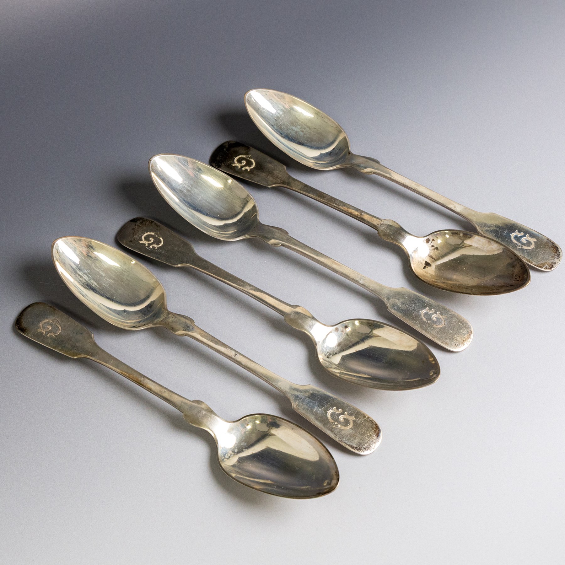 Set of six German silver Fiddle pattern table spoons with engraved initials to terminal, 800 standard with crescent and crown mark
