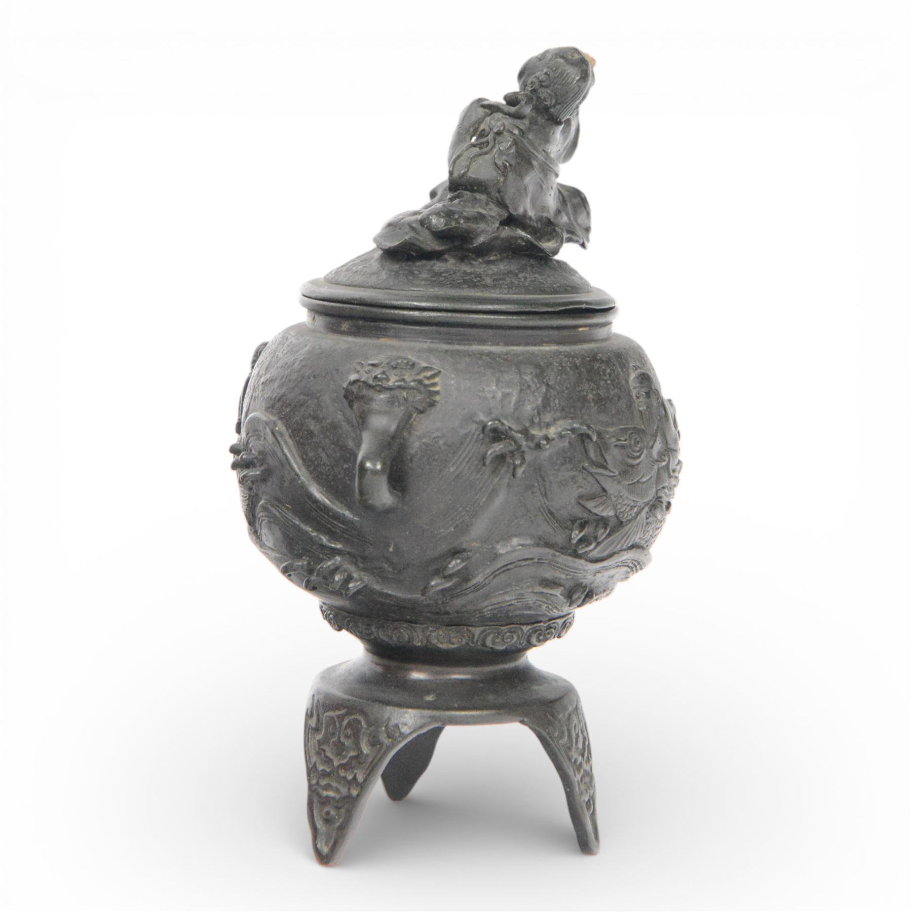 Pair of Japanese bronze koro, raised upon three feet, he body of the koro decorated with figures and animals, the cover mounted with figures, H24cm