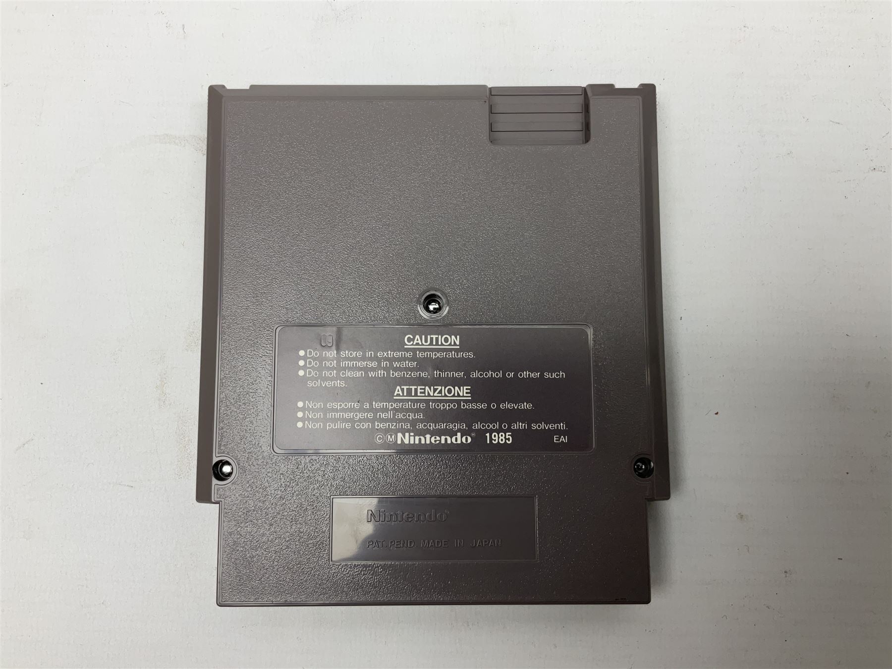 Nintendo Entertainment System (1985) console with two controllers, accessories and instruction booklet. NES Games ‘Duck Hunt’ with Nintendo Zapper gun, ‘Pinball’ and ‘Super Mario Bros.’, all with original sleeves and instruction booklets. NES game ‘Super Mario Bros. 2’ cartridge only