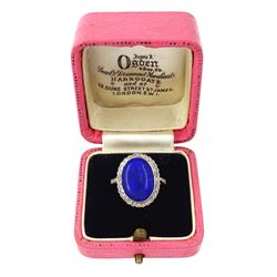 Early - mid 20th century 18ct gold and platinum lapis lazuli and diamond cluster ring, oval cut lapis lazuli surrounded by milgrain set rose cut diamonds, with diamond set shoulders
