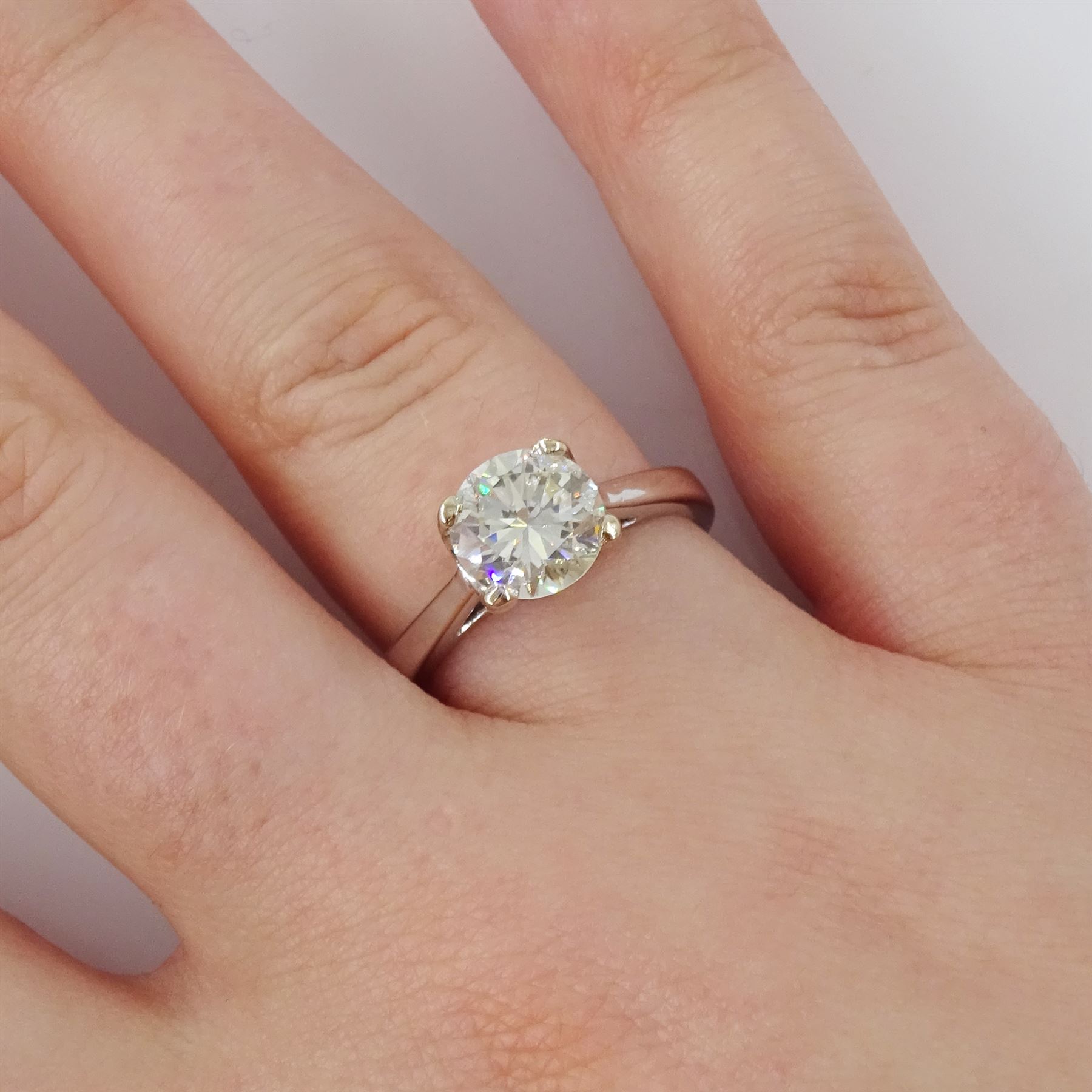 18ct two tone gold diamond ring, single round brilliant cut diamond of approx 1.70 carat, in a four claw setting, hallmarked