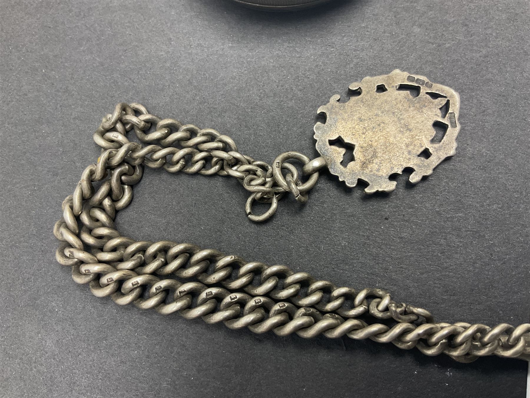 Five Victorian and early 20th century silver lever pocket watches including keyless half hunter, Fattorini & Sons, Bradford, Thomas Russell & Sons, Liverpool and Thomas Yates, Preston and a silver graduating Albert chain with fob