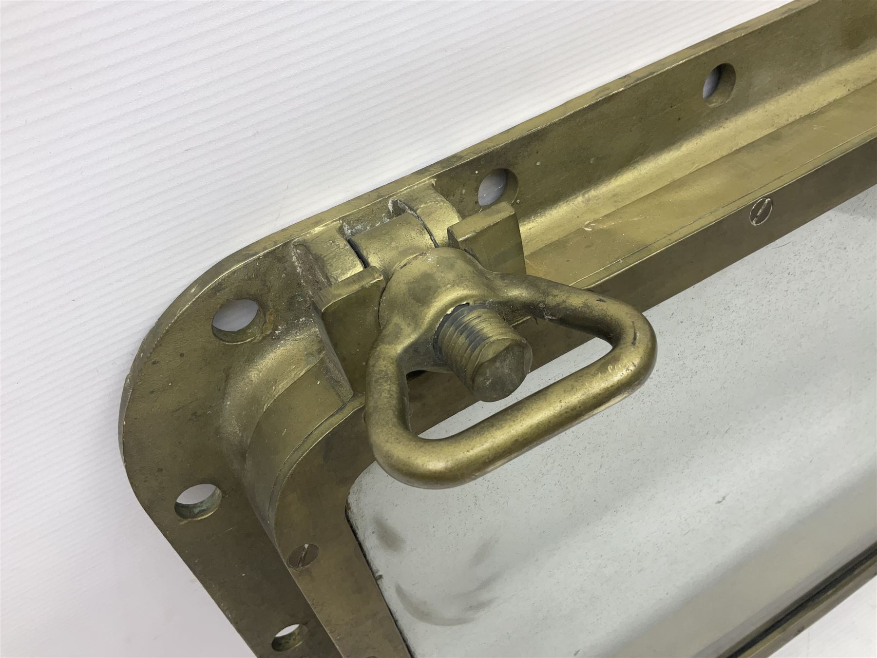 Rectangular brass porthole with hinged window, H46cm, L66cm