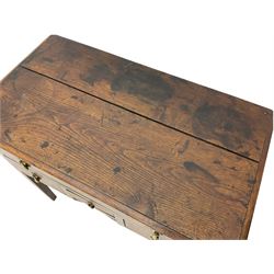 18th century Welsh oak lowboy, fitted with long drawer above three small drawers, square tapering supports, with fan carved corner brackets, circular plate and drop handles 